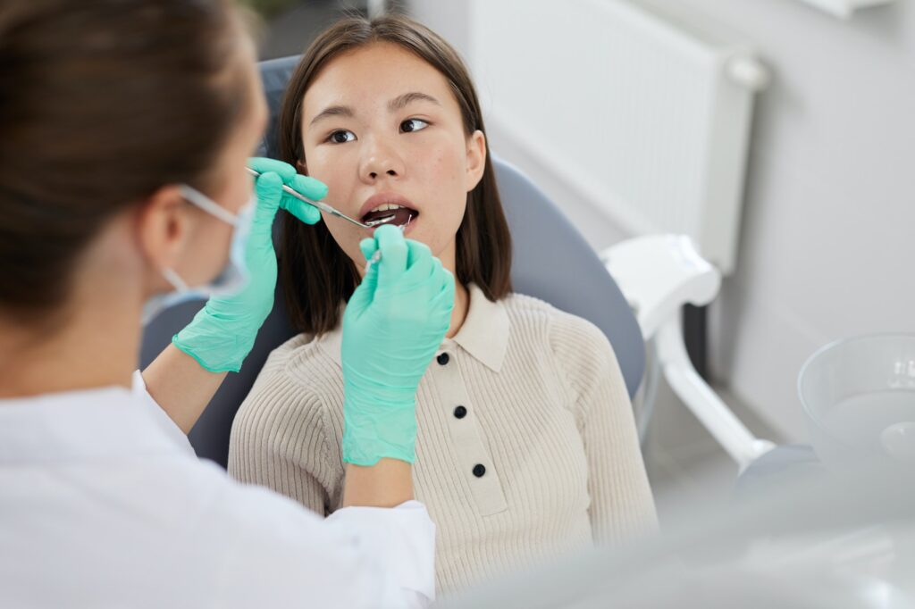 Asian Girl in Dental Chair